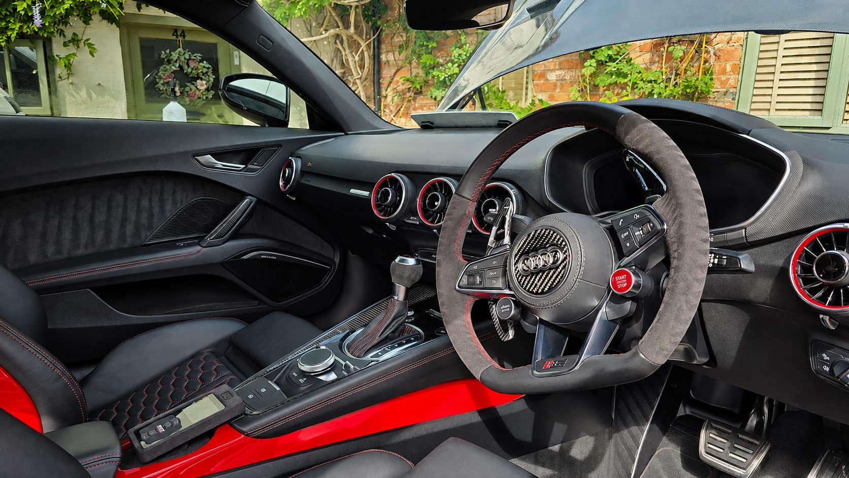 Audi TT RS cabin with black and red Nappa leather, alcantara steering wheel and dashboard cleaned and dressed by Blue Horizon Detailing, Warwickshire