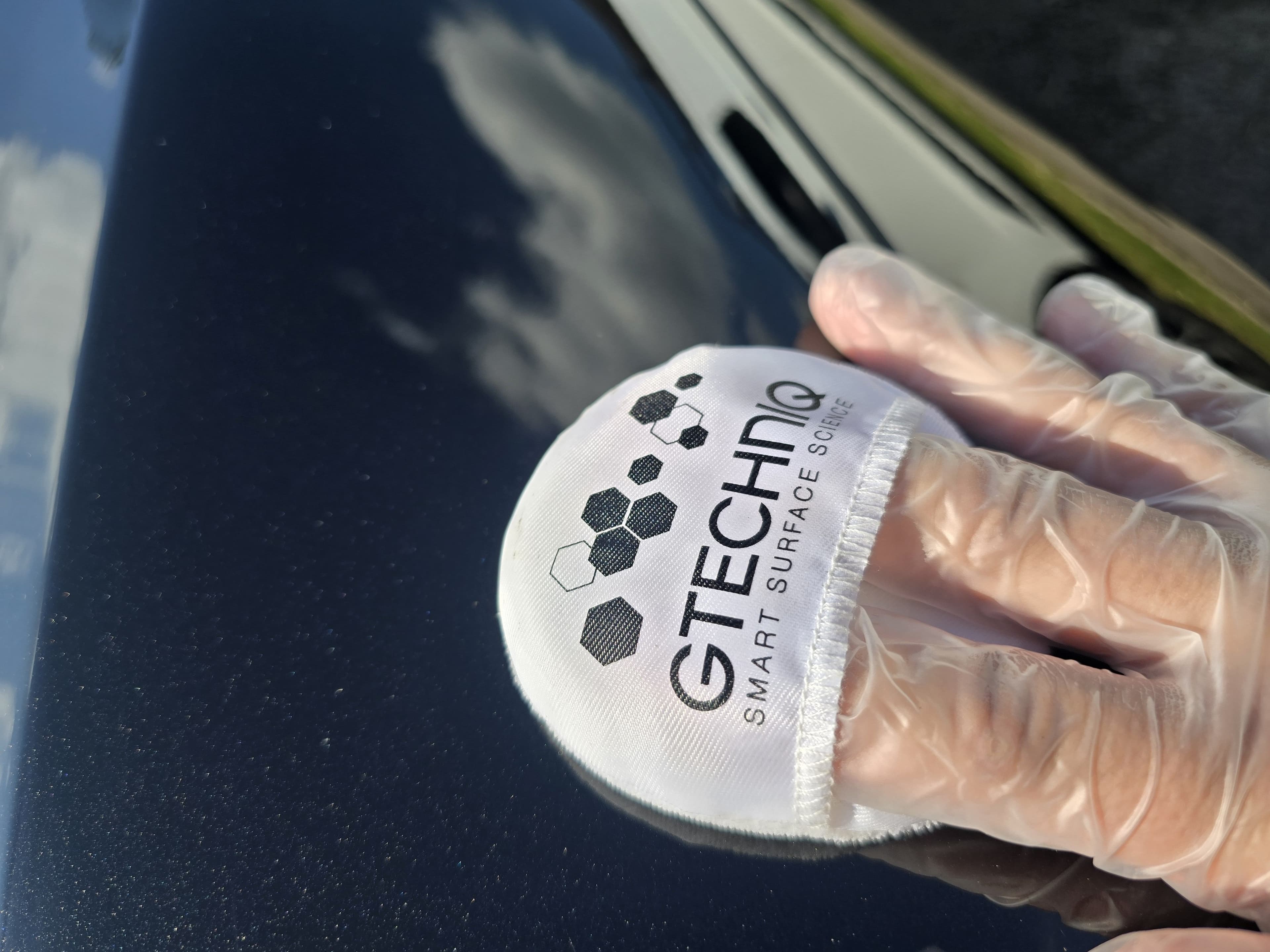Professional ceramic coating application in progress on vehicle paintwork — mobile service by Blue Horizon Detailing, Warwickshire