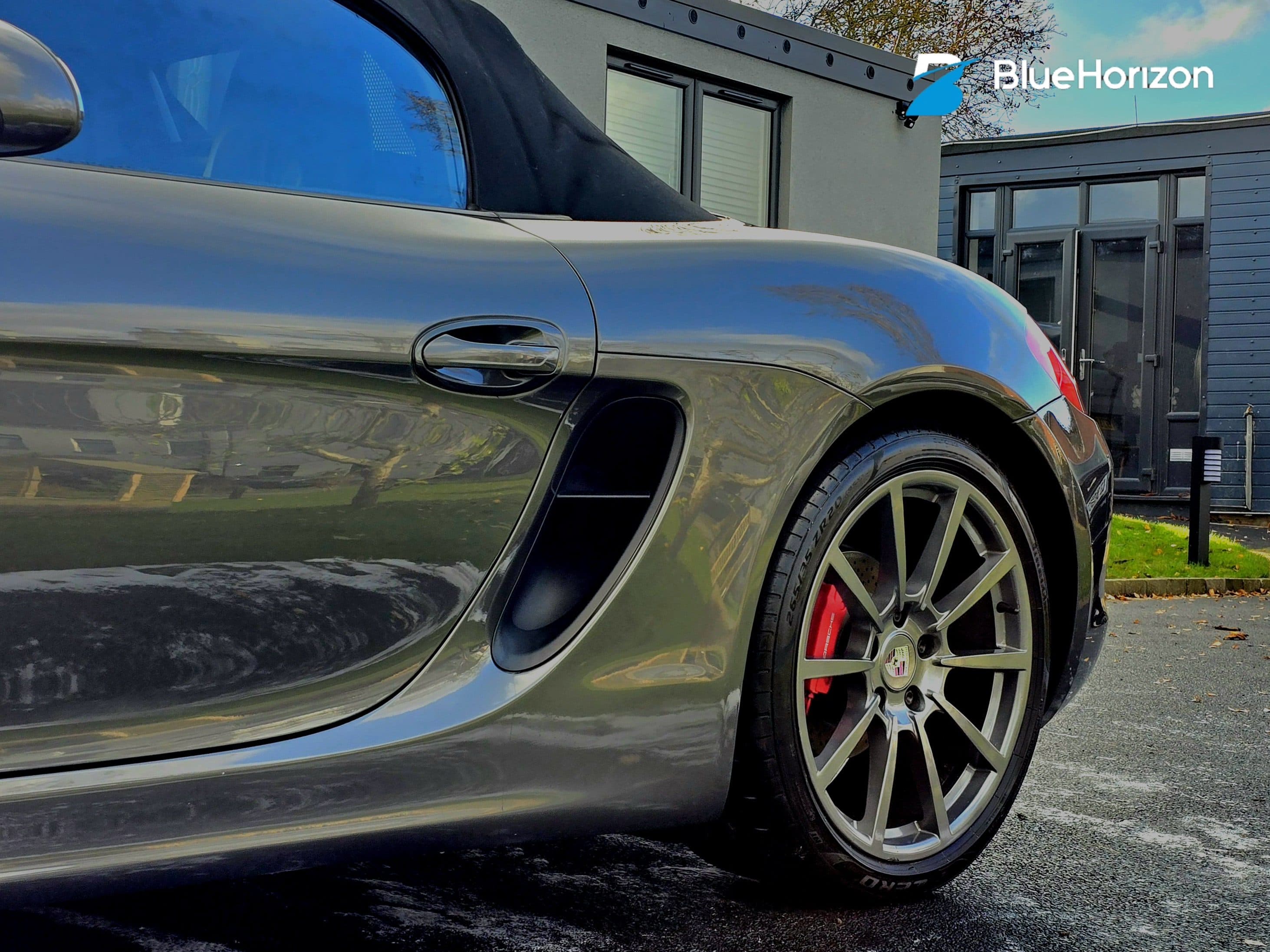 Porsche Cayman showing deep gloss exterior after Blue Horizon Detailing treatment — paint correction and protection Warwickshire