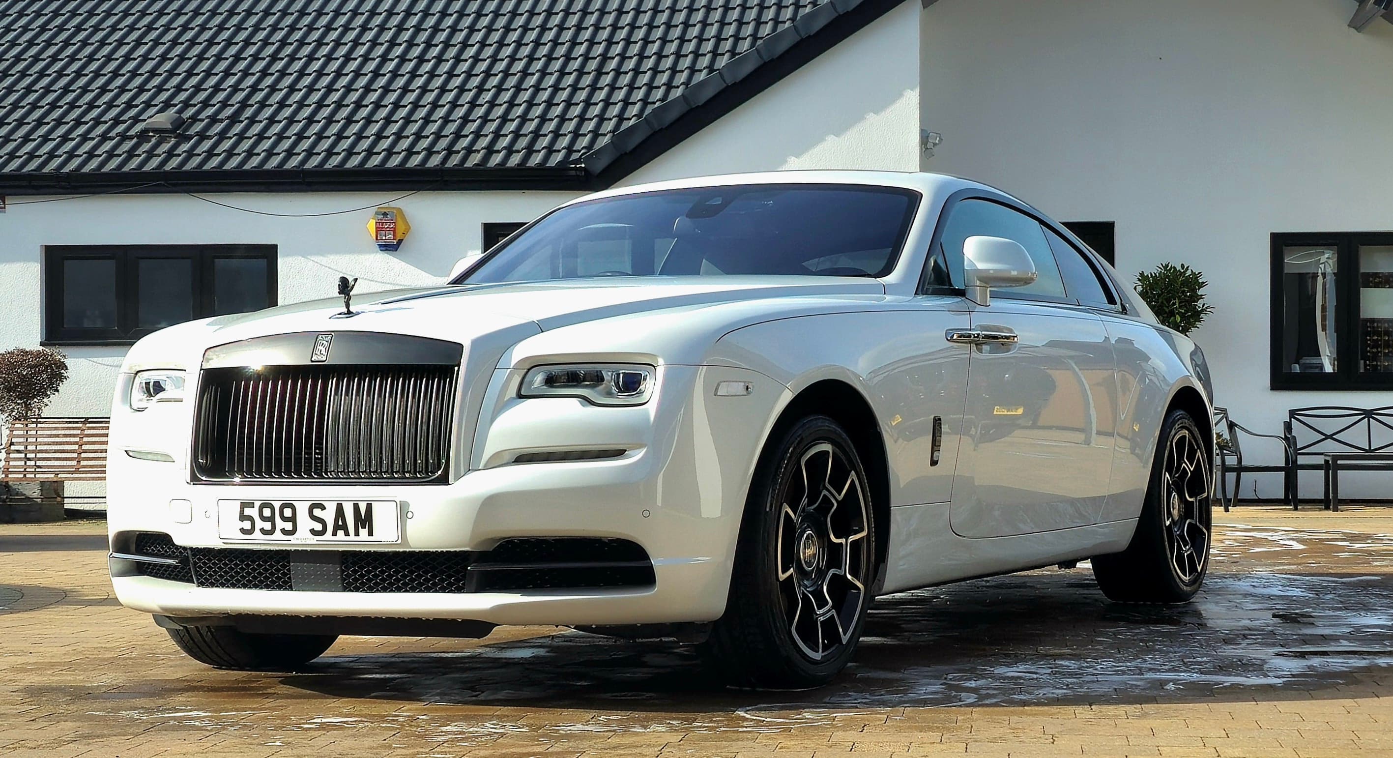 White Rolls-Royce Ghost Black Badge showing immaculate gloss finish after full deep clean by Blue Horizon Detailing, Warwickshire