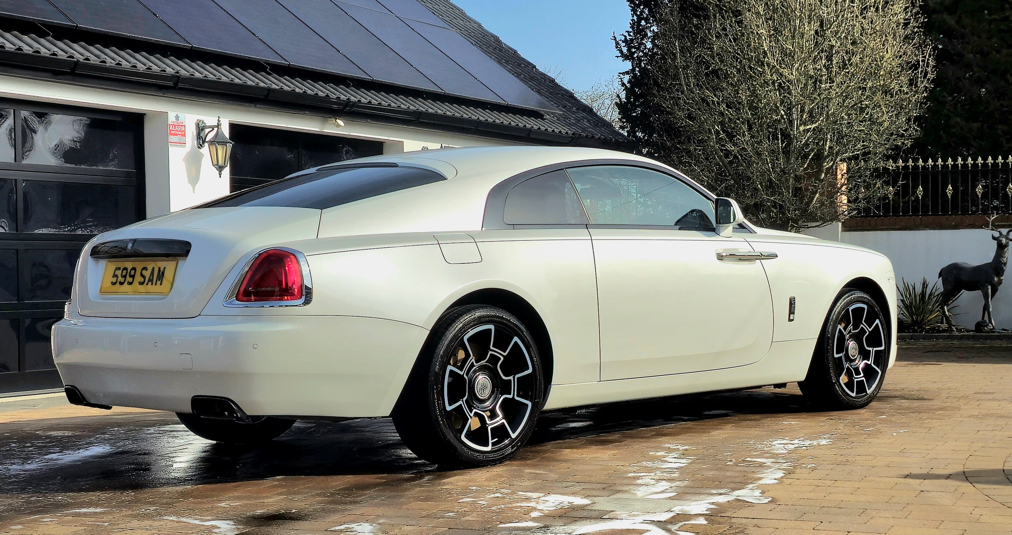 Rolls-Royce Ghost rear quarter with flawless reflective paintwork after detailing by Blue Horizon Detailing, Warwickshire